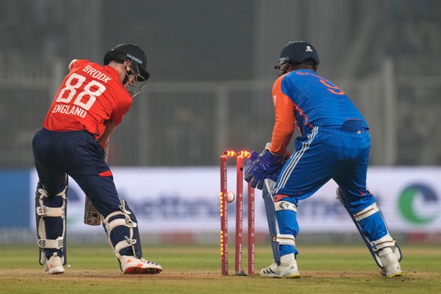 Harry Brook, left, is bowled by India’s Varun Chakravarthy