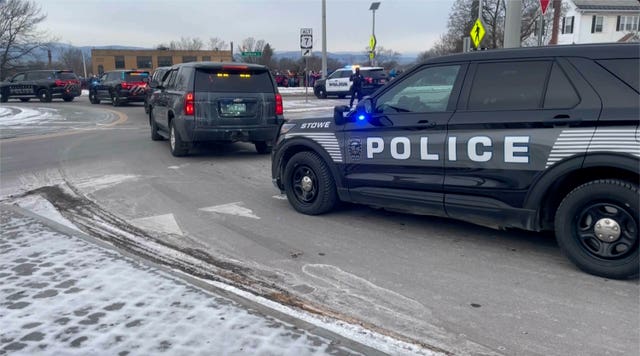 Police follow a hearse carrying fallen border patrol agent David Maland