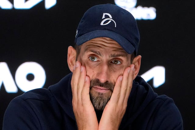 Novak Djokovic of Serbia reacts at a press conference after retiring in his Australian Open semi-final last month