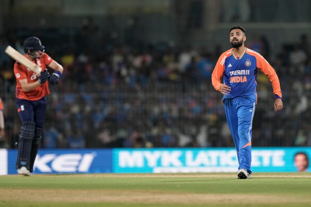 India’s Varun Chakravarthy, right, celebrates(Mahesh Kumar A/AP)