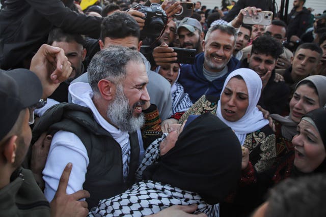 Freed Palestinian prisoners are greeted by relatives