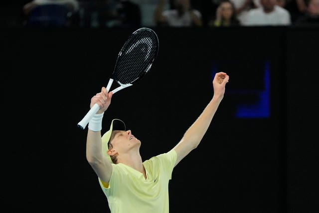 Jannik Sinner celebrates after defeating Alexander Zverev 