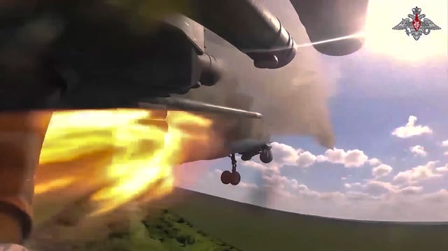 A Russian army helicopter MI-35 launches rockets toward Ukrainian position