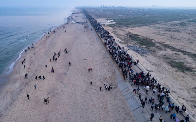 An aerial photograph taken by a drone shows displaced Palestinians return to their homes