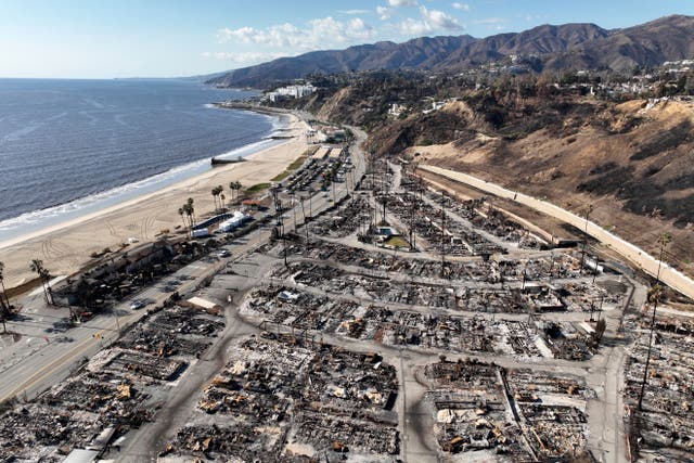 Aerial view of burnt-out homes along the coast