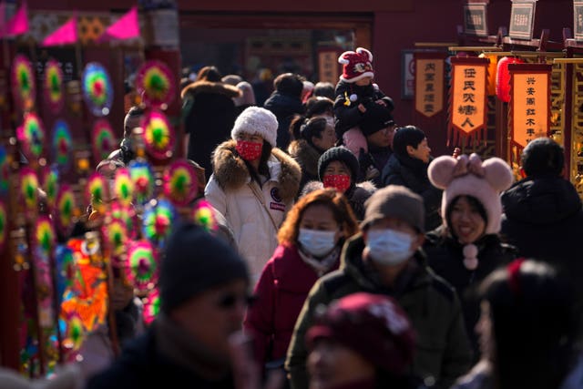 People visit a temple fair