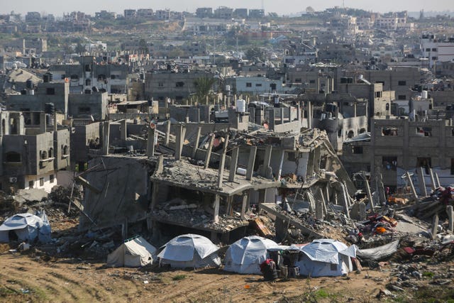 Tents set up next to houses destroyed by Israeli bombardment in Beit Lahia, northern Gaza