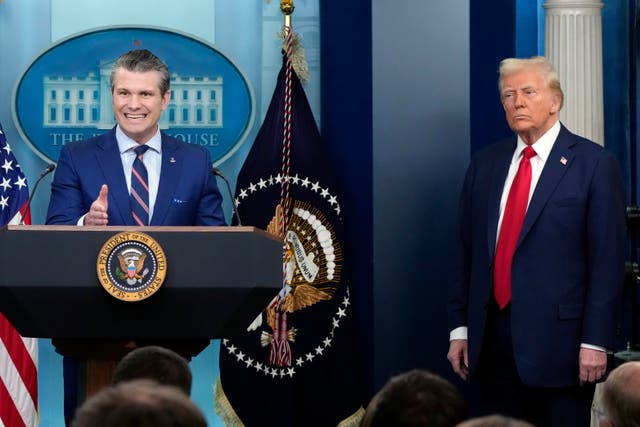 President Donald Trump listens as Defence Secretary Pete Hegseth speaks in the James Brady Press Briefing Room at the White House