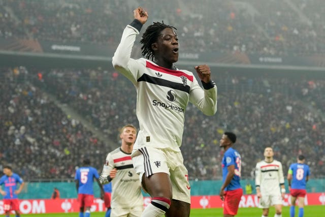 Manchester United’s Kobbie Mainoo celebrates after scoring his side’s second goal