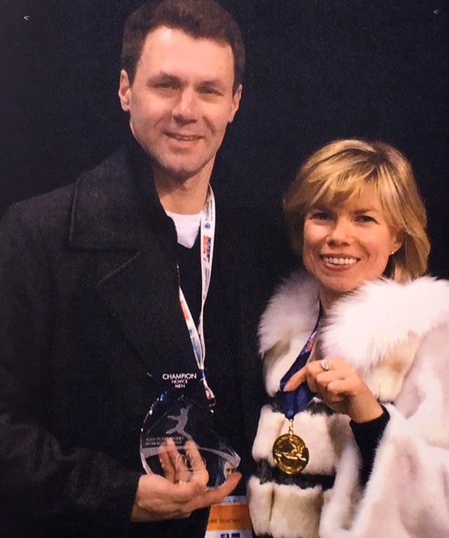 Skating coaches Vadim Naumov, left, and Evgenia Shishkova 