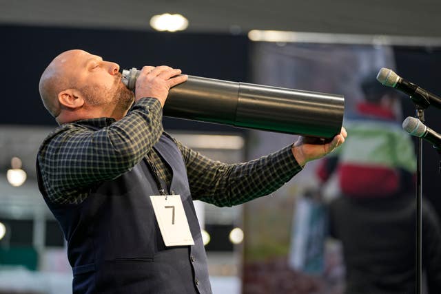 Stefan Lamoly performs to imitate a stag in heat 