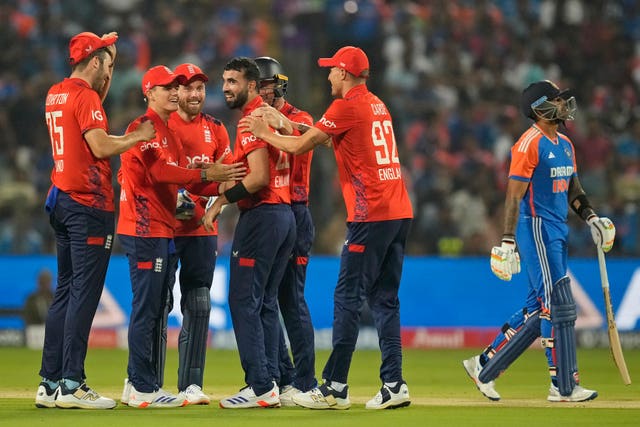 Saqib Mahmood, centre, took three wickets in the first over