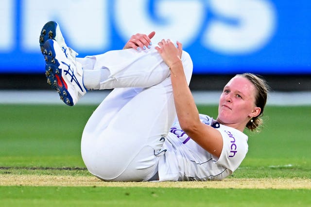 Lauren Filer takes a tumble during the Women's Ashes Test in Melbourne.