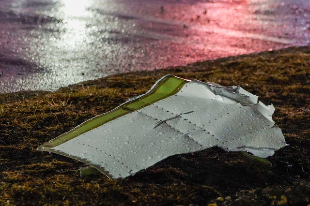 Plane debris in a parking lot