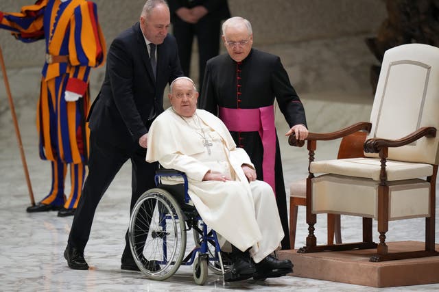 The Pope in a wheelchair