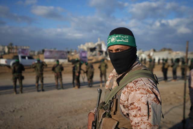 Hamas militants deploy and take up positions ahead of Israeli Ofer Kalderon’s release