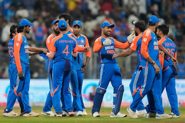 Indian players celebrate after winning the match