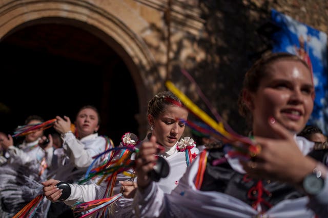 Women dance during the ‘Endiablada’ traditional festival in Almonacid del Marquesado