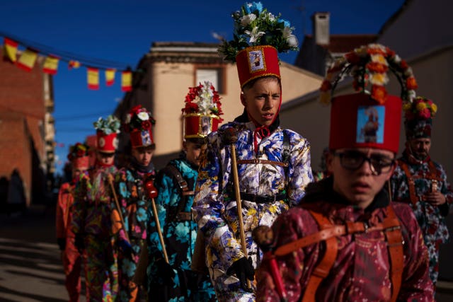 Members of the Endiablada brotherhood march during the ‘Endiablada’ traditional festival