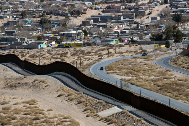 The Anapra neighborhood of Ciudad Juarez, Mexico, is seen behind the border wall in Sunland Park, New Mexico