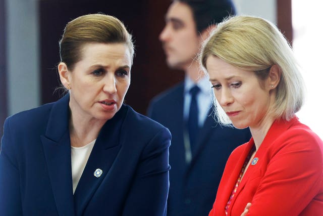 Denmark’s Prime Minister Mette Frederiksen, left, speaks with European Union foreign policy chief Kaja Kallas 