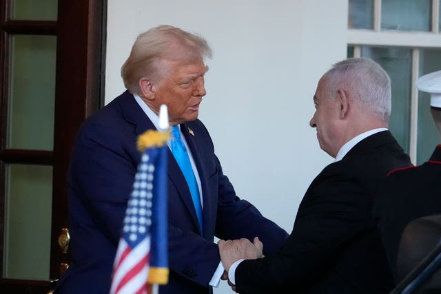 Donald Trump greets Benjamin Netanyahu