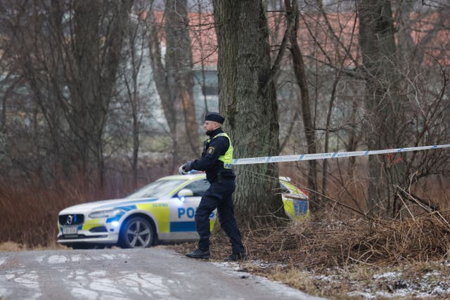 Police at the scene of the shooting in Orebro