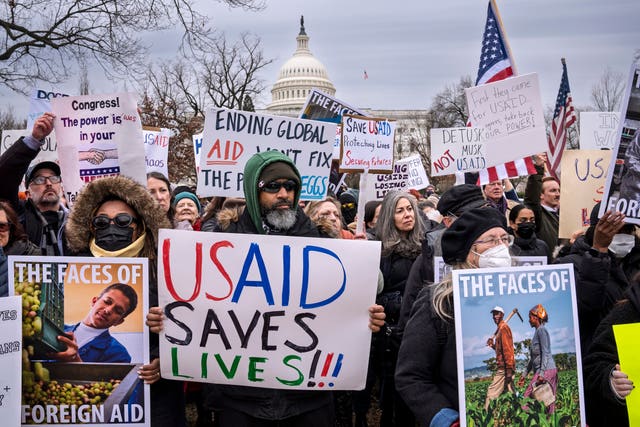 Demonstrators and lawmakers rally against President Donald Trump and his ally Elon Musk as they disrupt the federal government, including dismantling the U.S. Agency for International Development, which administers foreign aid approved by Congress