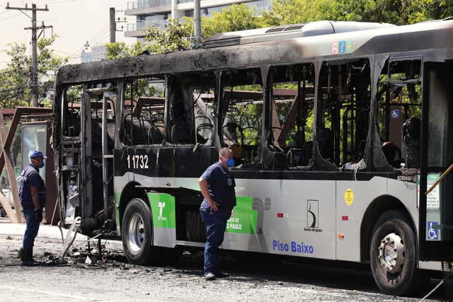 Police inspect a bus 