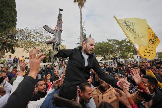 Freed Palestinian prisoner Ammar al-Daghma is greeted by a crowd as he arrives in the Gaza Strip