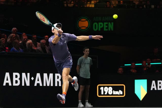 Alex De Minaur stretches for a forehand 