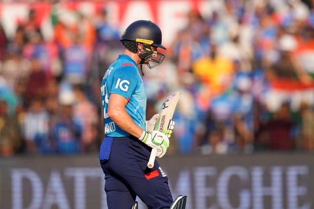 England captain Jos Buttler walks off the field after being dismissed against India