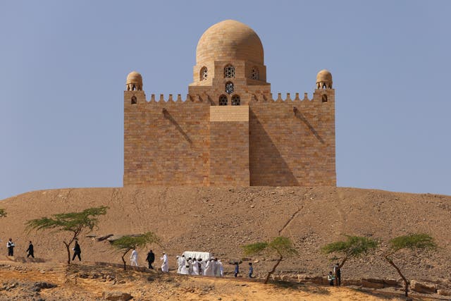 People carry the coffin of Prince Karim Al-Hussaini, the Aga Khan IV and 49th hereditary imam of the Shiite Ismaili Muslims, to be buried at the Aga Khan mausoleum in Aswan, Egypt