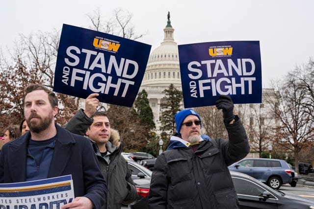 Activists join civil service workers to protest the policies of President Donald Trump and Elon Musk outside the Capitol in Washington on Tuesday