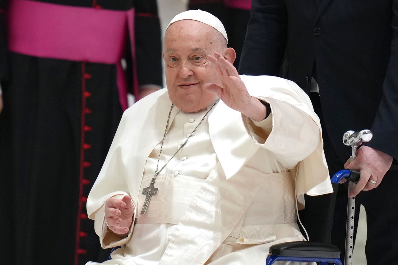 Pope sitting up out of bed in hospital as he recovers from pneumonia ...