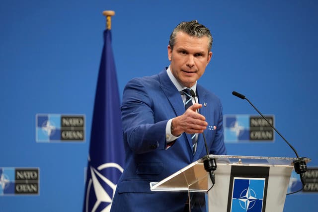 Man in blue suit during a speech 