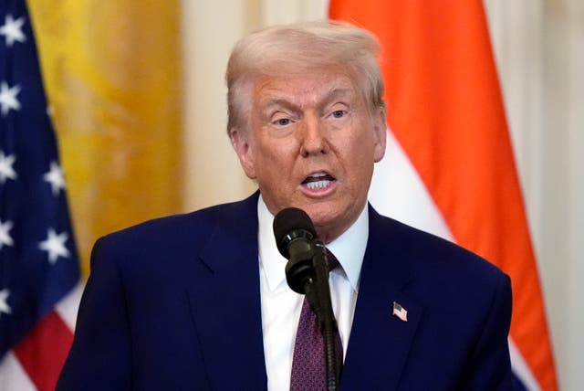 President Donald Trump speaks during a news conference in the East Room of the White House in Washington