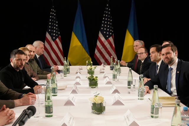 Ukraine’s President Volodymyr Zelensky, left, and United States vice-president JD Vance, right, pose during a meeting on the sidelines of the Munich Security Conference in Munich, Germany 