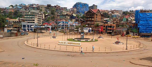 People walk past an independence square in Bukavu, eastern Congo