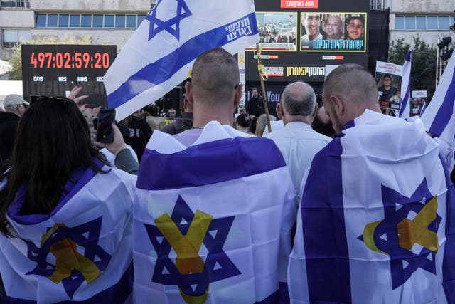 Israelis watch a live broadcast from the Gaza Strip 