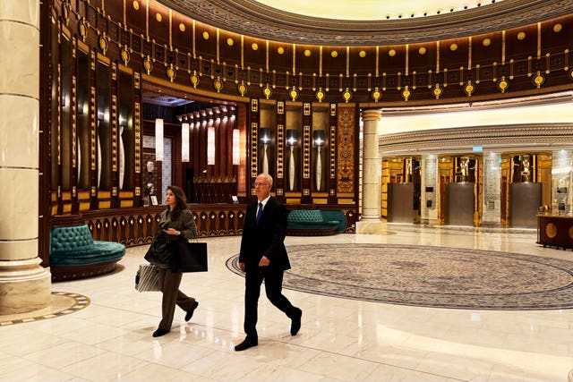 Kirill Dmitriev, the head of the Russian Direct Investment Fund, right, at the Ritz Carlton hotel in Riyadh