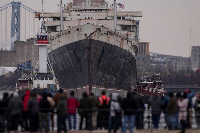 People lining the waterfront to see the SS United States