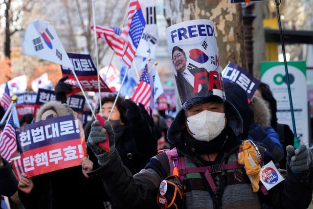 Supporters of impeached South Korean President Yoon Suk Yeol near the Constitutional Court in Seoul