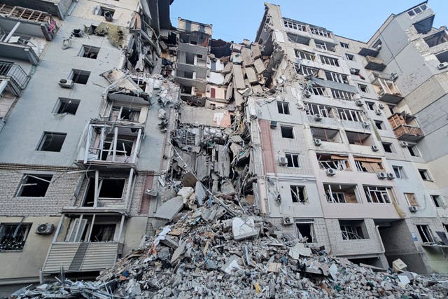 A building is seen heavily damaged by a Russian strike in Kherson, Ukraine