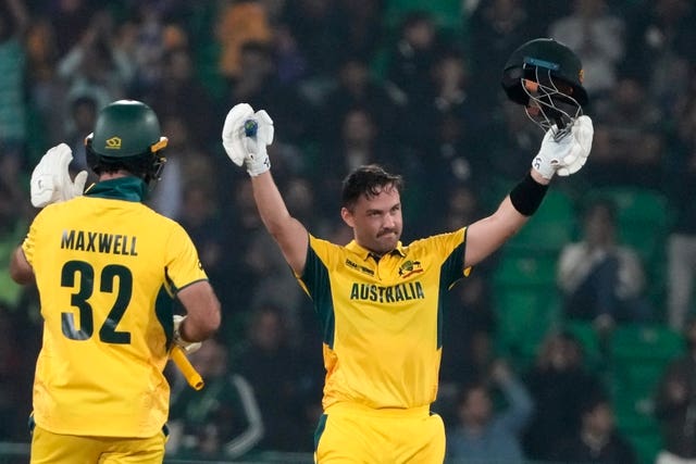 Australia’s Josh Inglis, right, celebrates his century