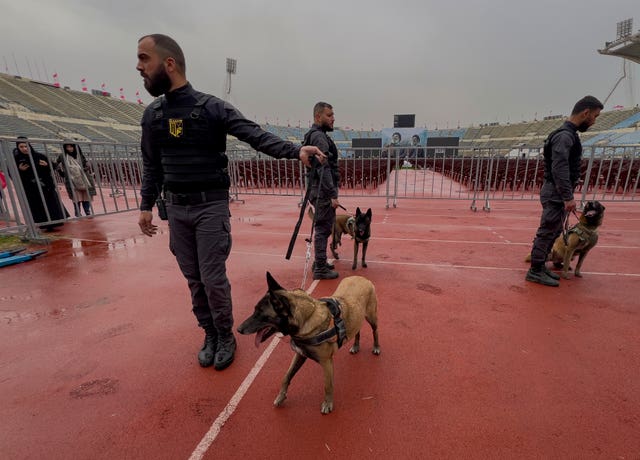 Hezbollah security members with their dogs