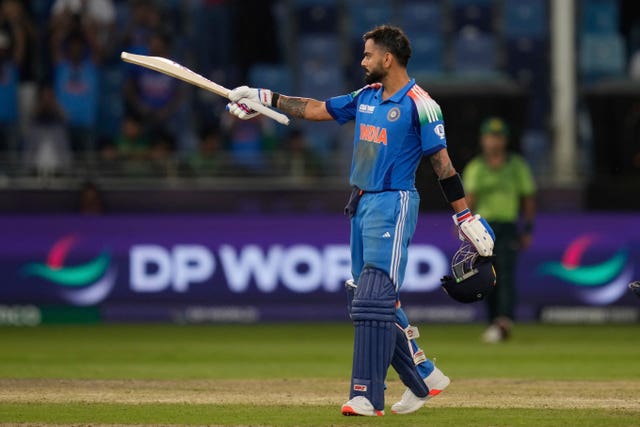 Virat Kohli celebrates his century