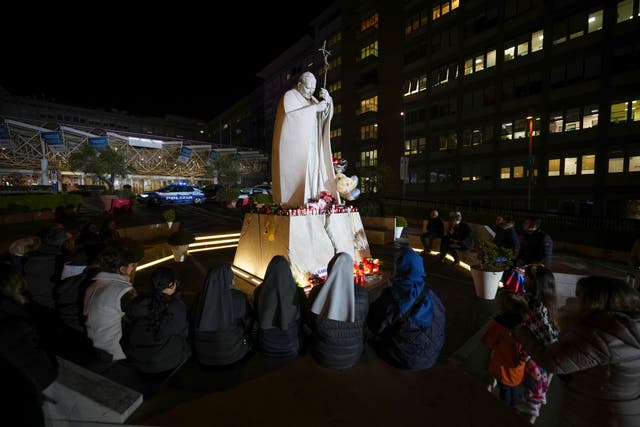 People pray for Pope Francis (Andrew Medichini/AP)