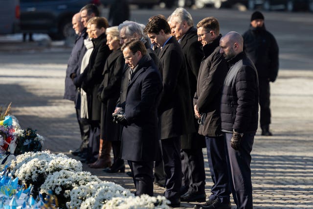 European leaders attend a ceremony at the memorial to the fallen Ukrainian soldiers in Kyiv