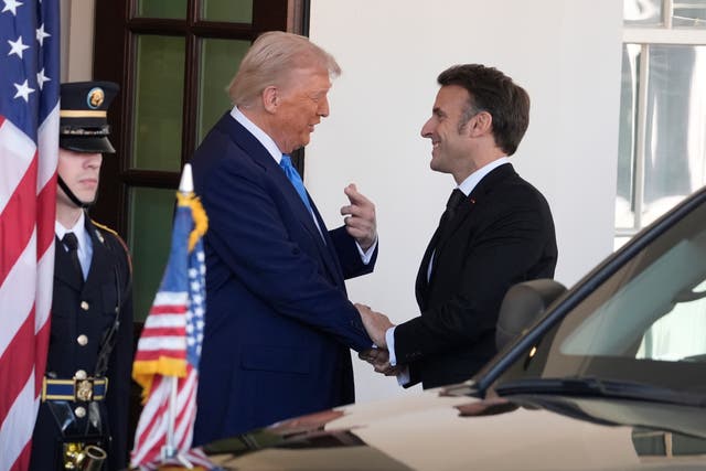 Donald Trump greets Emmanuel Macron at the White House